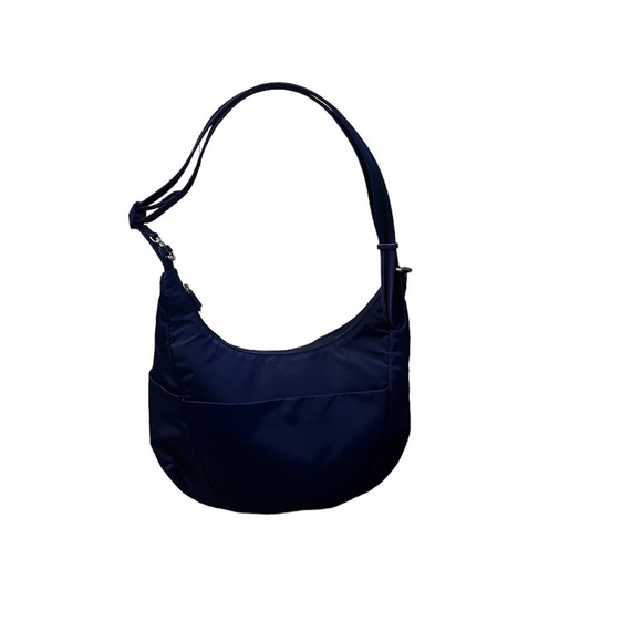 NWT Pacsafe City safe Cx Crossbody Blue Anti Theft Crossbody Moonshape Bag - Picture 10 of 16